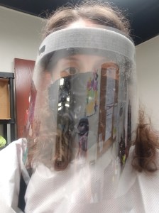 Author Ashley Crookham in covid-19 ppe